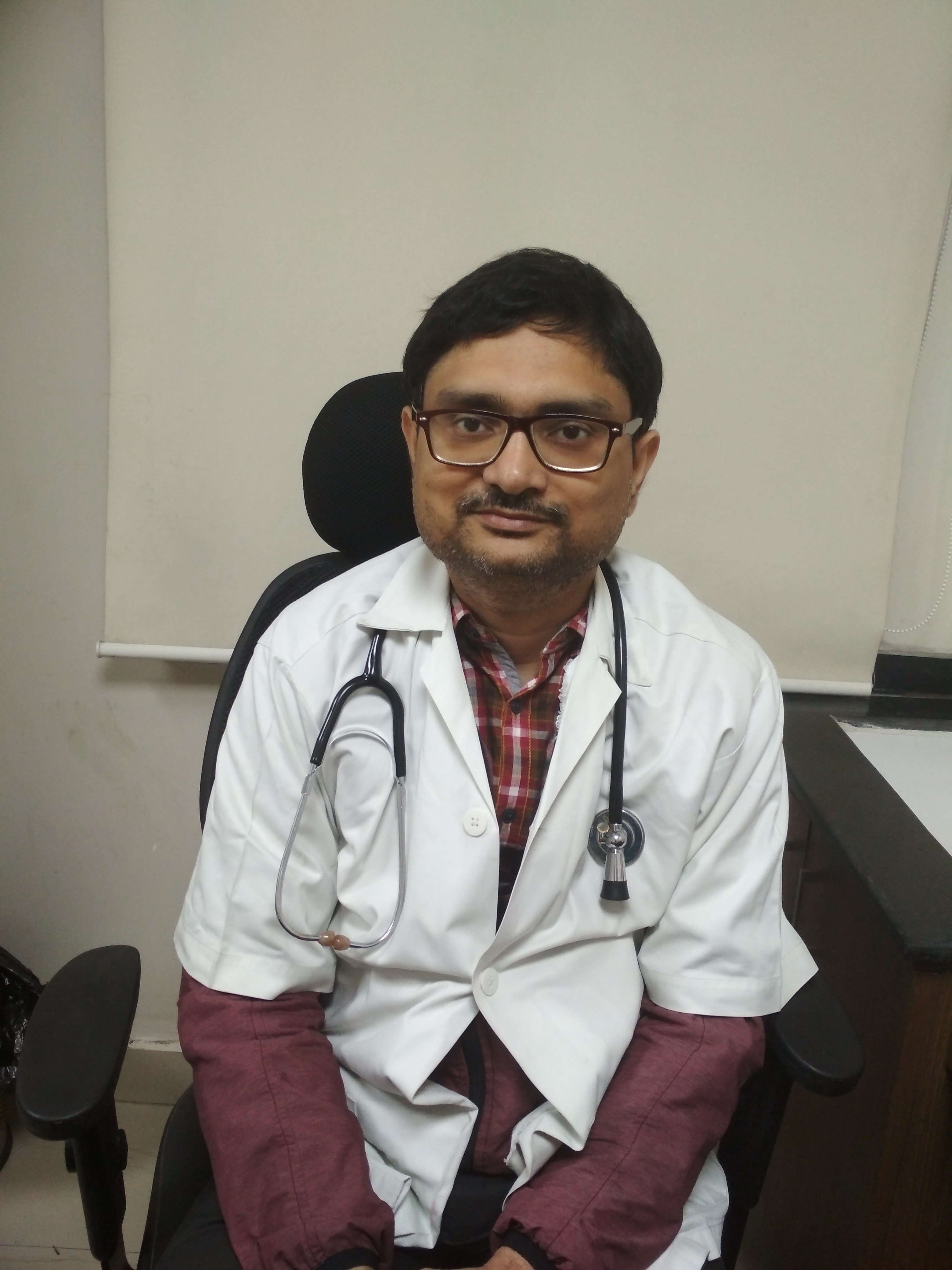 Dr. Manish Saha